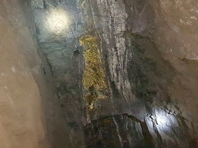 Photo 1. Mineralization and textures of the Rosario vein exposed in underground historic mine workings.