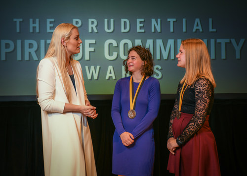 Olympic gold medalist and World Cup champion Lindsey Vonn congratulates Sophie Bernstein, 18, of St. Louis (center) and Katelyn Ravasini, 14, of Lee's Summit (right) on being named Missouri's top two youth volunteers for 2018 by The Prudential Spirit of Community Awards. Sophie and Katelyn were honored at a ceremony on Sunday, April 29 at the Smithsonian's National Museum of Natural History, where they each received a $1,000 award.