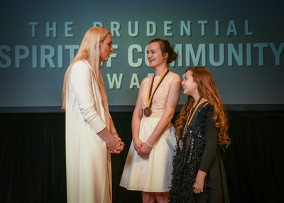 Olympic gold medalist and World Cup champion Lindsey Vonn congratulates Jetta Harvey, 16, of Beatrice (center) and Kadynce Mullins, 10, of Nebraska City (right) on being named Nebraska's top two youth volunteers for 2018 by The Prudential Spirit of Community Awards. Jetta and Kadynce were honored at a ceremony on Sunday, April 29 at the Smithsonian's National Museum of Natural History, where they each received a $1,000 award.