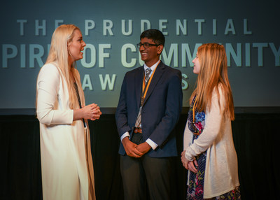 Olympic gold medalist and World Cup champion Lindsey Vonn congratulates Praneeth Alla, 16, of Exton (center) and Ashley Geesey, 13, of Bainbridge (right) on being named Pennsylvania's top two youth volunteers for 2018 by The Prudential Spirit of Community Awards. Praneeth and Ashley were honored at a ceremony on Sunday, April 29 at the Smithsonian's National Museum of Natural History, where they each received a $1,000 award.