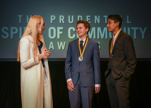 Olympic gold medalist and World Cup champion Lindsey Vonn congratulates Ryan Guggenheim, 18, of St. Paul (center) and Shrey Pothini, 14, of Savage (right) on being named Minnesota's top two youth volunteers for 2018 by The Prudential Spirit of Community Awards. Ryan and Shrey were honored at a ceremony on Sunday, April 29 at the Smithsonian's National Museum of Natural History, where they each received a $1,000 award.