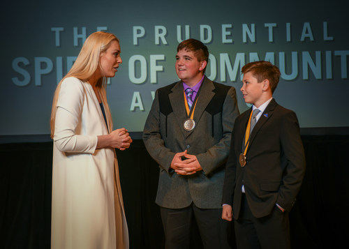 Olympic gold medalist and World Cup champion Lindsey Vonn congratulates Logan Grosz, 18, of Torrington (center) and Seamus Casey, 14, of Gillette (right) on being named Wyoming's top two youth volunteers for 2018 by The Prudential Spirit of Community Awards. Logan and Seamus were honored at a ceremony on Sunday, April 29 at the Smithsonian's National Museum of Natural History, where they each received a $1,000 award.