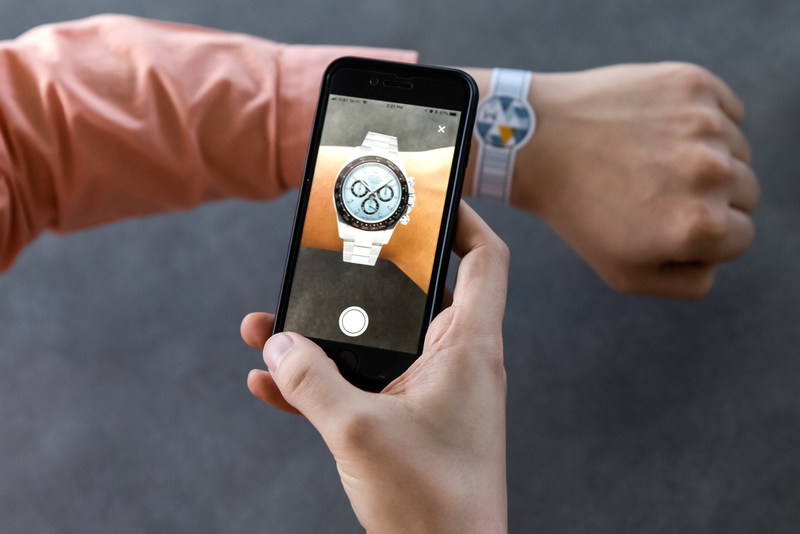 The WatchBox AR component allows customers to see how a watch will look on their wrists before buying online.