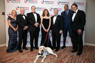 PenFed President and CEO James Schenck with Honorees at the 2018 Night of Heroes Gala. Pictured left to right: Allied Solutions CEO Pete Hilger and his wife Debbie, New England Patriots Head Coach Bill Belichick, Emcee and WUSA9 Washington Investigative Reporter Andrea McCarren and her service dog in training Nigel, PenFed Credit Union President and CEO James Schenck, U.S. Army Master Sgt. (Ret.) Cedric King, and Co-Founder of Animal Rescue Foundation Tony La Russa.