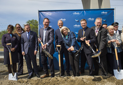 Community leaders join Alaska Airlines for the groundbreaking of a new building near Sea-Tac International Airport. Pictured from L to R: Megan Brown, Lindsey Werner, King County Executive Dow Constantine, Alaska Airlines CEO Brad Tilden, Washington Governor Jay Inslee, Alaska Air Group lead independent director Patricia Bedient, King County Councilmember Dave Upthegrove, SeaTac Mayor Michael Siefkes, Washington Senator Karen Keiser and Alaska Airlines Captain Charlie Wright.