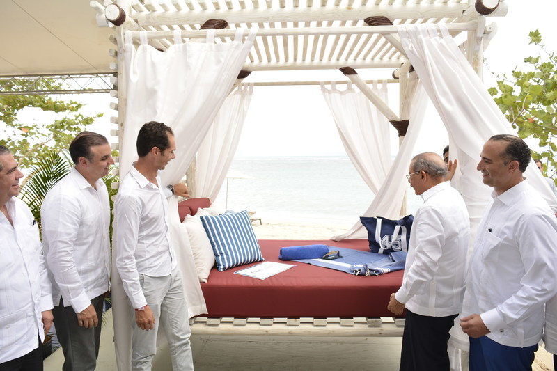 Pictured above is Xavier Mufraggi (left), CEO of Club Med North America and H. E. Danilo Medina Sánchez (right), President of the Dominican Republic, officially opening the curtains of the hallmark icon for Club Med Michès - the resort’s first cabana – as part of the groundbreaking event.