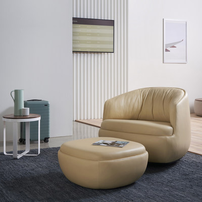 Gimbal Low Back Lounge Rocker from Hightower. Shown here with ottoman and Ribbon Table. All pieces designed by Most Modest.