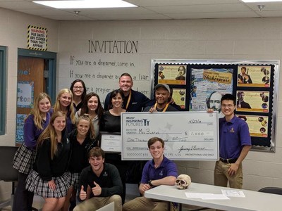 Named one of 30 Inspiring Teachers in America in 2018, Chasidy Burton celebrates with students of Lipscomb Academy and Mister Car Wash associates during their recent check presentation in Nashville. Upon receiving the good news of her $1,000 Mister Car Wash classroom grant, Burton acknowledged her passion for developing empathy in students and her desire to help them discover their voice as agents of positive change.
