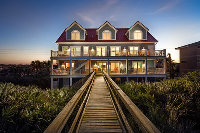 The home's private boardwalk leads directly to the sands of Flagler Beach. More at PlatinumLuxuryAuctions.com.