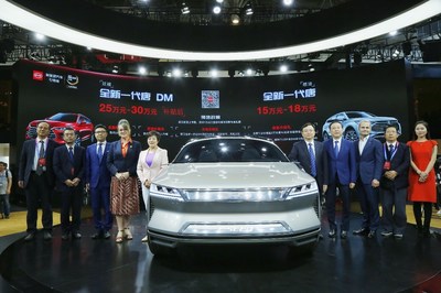 Senior officials of BYD with the concept car E-SEED at the recently concluded Beijing Auto Show