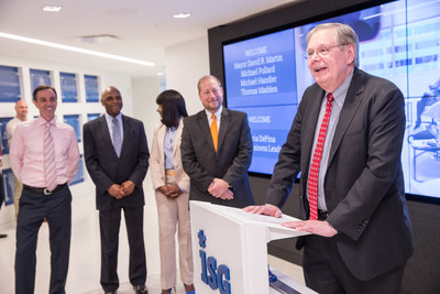 Stamford Mayor David R. Martin is shown speaking at the grand opening of the new Information Services Group (ISG) global headquarters at 2187 Atlantic Street in Stamford, Connecticut, on May 9, 2018. With the mayor are (from left) Michael Handler, chief financial officer of the City of Stamford; Michael Pollard, chief of staff to the mayor; Gloria DePina, member of the Stamford Board of Representatives and an aide to U.S. Representative Jim Himes; and Thomas Madden, director of economic development for the City of Stamford. The officials were on hand to mark the opening of ISG's new state-of-the art facility, a digital showcase for the Workplace of the Future, in the Harbor Point area of Stamford. ISG is a leading global technology research and advisory firm and a trusted business partner to more than 700 clients, including 75 of the top 100 enterprises in the world.