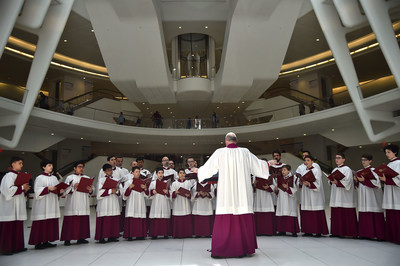 The Sistine Chapel Choir from Vatican City surprises and mesmerizes at The Oculus at Westfield World Trade Center in New York City with a song of prayer and peace. Photo credit: Theo Wargo/Getty Images