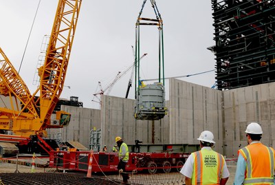 Vogtle Unit 4 step-up transformer is lifted into place in May 2018.