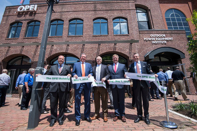 OPEI board members celebrate after the ribbon cutting as more than 100 guests and partners visit the association’s new headquarters building in Old Town Alexandria, Va., on May 7, 2018. Pictured left to right: Bjoern Fischer, President, STIHL Incorporated; Daniel T. Ariens, Chairman & CEO, Ariens Company, and Chair of the OPEI Board of Directors; Kris Kiser, President and CEO, OPEI; Tom Cromwell, Group President – Power, Kohler Company; and Tom Duncan, President & CEO, Positec. (PRNewsfoto/Outdoor Power Equipment Institu)