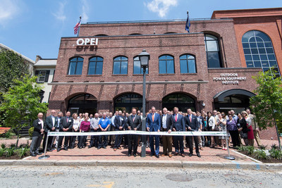 Members of the Outdoor Power Equipment Institute (OPEI)’s Board of Directors and more than 100 partners and friends get ready to cut the ceremonial ribbon on May 7, 2018 to open the association’s new headquarters building in Old Town Alexandria, Va. OPEI is an international trade association representing more than 100 power equipment, engine and utility vehicle manufacturers and suppliers. (PRNewsfoto/Outdoor Power Equipment Institu)