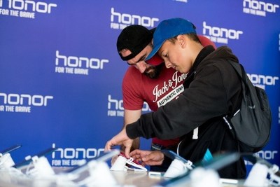 Fans testing out the new flagship product Honor 10, which will be launched in London on May 15, 2018