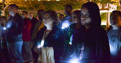 Jean Williams, mother of fallen correctional officer Eric Williams, and Helen Albarati, widow of fallen correctional officer Osvaldo Albarati, gather at a candlelight vigil for correctional workers in Washington, D.C.