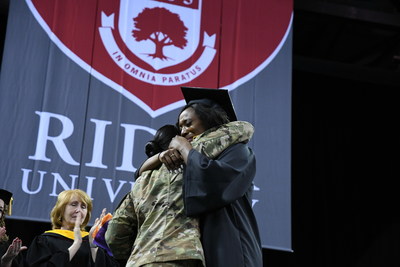 Shamera Smith, deployed in Iraq for the past 10 months, made it home in time to surprise her sister Tyshae Smith at Rider University's commencement ceremony.