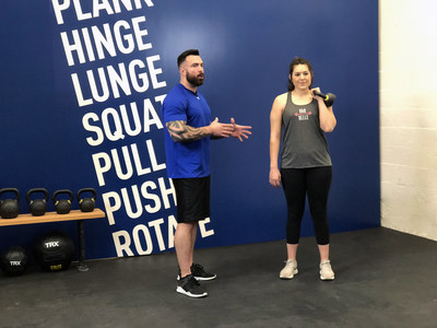 In-Shape master trainer, Damian Weber, using the new MOVE7 system to educate personal trainer Rachel Rodriquez from Manteca as part of In-Shape's investment in team member development and dedication to consistent client experience.