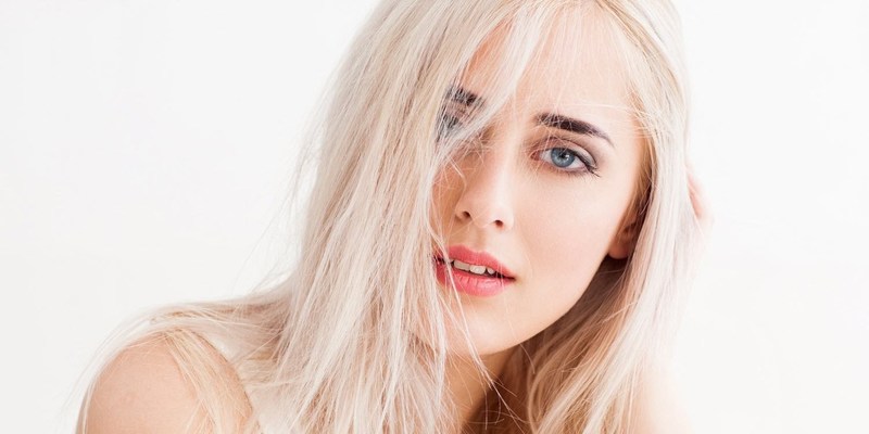4 Reasons Your Blonde Hair Could Be Turning Yellow And Why Purple