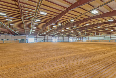 Shown above, the 70,000-sf arena features extensive lighting and heating systems, stalls for horses/cattle, an entertainment lounge, tack room, guest apartment, fitness center and restrooms. Learn more at UtahLuxuryAuction.com.