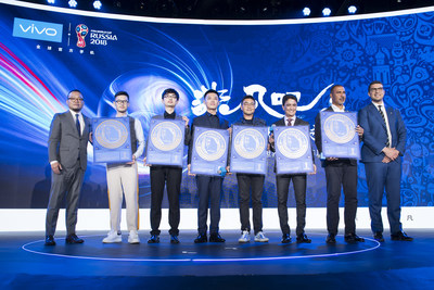 Four Vivo Super Fan Photographers receive the certificate of endorsement from Vivo Brand Vice President Deng Li, former FIFA World Cup Winner Bebeto and former Dutch International Ruud Gullit