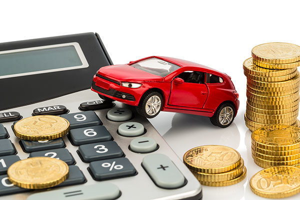 car and calculator. rising costs for buying a car, leasing, workshop, refueling and insurance