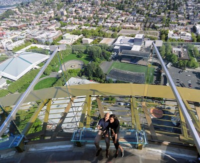 First guests to experience the Space Needle's newly installed Skyrisers, located 520 feet in the air.