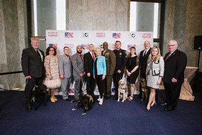 More than 200 VIPs came to Capitol Hill to salute America's military hero dogs with American Humane's Lois Pope K-9 Medal of Courage, including (left to right): Sgt. Dennis Dow (ret.) with Jag and Jacqueline Dow; Eddie Valadez, Sgt. Kevin Zuniga and Taker; Rear Admiral Thomas Kearney (ret.); philanthropist Lois Pope; USMC Col. Zachary White; Sgt. Micah Jones with Summer; Heather Leider with Taba and Beck Leider; American Humane President Dr. Robin Ganzert; and American Humane Chairman John Payne