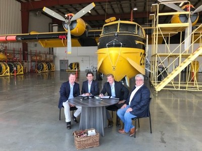 Bridger Aerospace Group Founder & President Tim Sheehy (3rd from left), and Bridger Co-Founder and Chairman Matt Sheehy (far left), join Longview Aviation Capital Chairman David Curtis (2nd from left), and Longview Aviation Asset Management Chief Operating Officer Robert Mauracher (far right) to sign the purchase agreement for Viking CL-415EAF Enhanced Aerial Firefighting aircraft at LAAM's facilities in Calgary, Alberta. The CL-215 aerial firefighter photographed here is one of eleven candidate aircraft specially selected for LAAM's CL-415EAF Conversion Program.