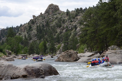 A commercial raft from a member of the Arkansas River Outfitters Association descends a rapid at low water in Browns Canyon National Monument in Chaffee County Colorado.
