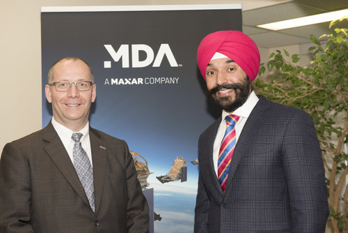 MDA Group President Mike Greenley with Honourable Navdeep Bains, Minister of Innovation, Science and Economic Development. (CNW Group/Maxar Technologies Ltd.)