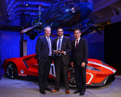 Rahul Gogate, Axalta Regional Business Director – Ford (middle) was presented with a Green Pillar Award recognizing Axalta’s leadership in coatings sustainability by Ford Motor Company’s Joe Hinrichs, Executive Vice President and President, Global Operations (left), and Hau Thai-Tang, Executive Vice President, Product Development and Purchasing (right). Photo credit: Ford.