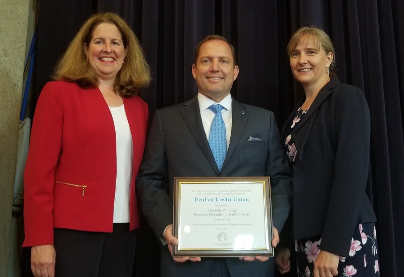 James Schenck, pictured with Alexandria, Virginia Mayor Allison Silberberg (left), accepts the 2018 Large Business Philanthropist of the Year Award from Volunteer Alexandria Executive Director Marion Brunken (right). Photo courtesy of Lucelle O’Flaherty.