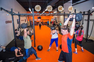 Tough Mudder Bootcamp grand opening celebration attendees of all fitness levels sample the new 45 minute high-intensity functional fitness workout at the flagship location in Burlington, Mass.