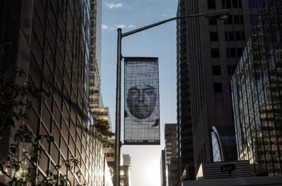 Ai Weiwei, Banner 2 installed on 55th Street outside Trump Tower as part of the citywide exhibition "Good Fences Make Good Neighbors," presented by Public Art Fund, October 12, 2017-February 11, 2018. Photo: Timothy Schenck, Courtesy Public Art Fund, NY