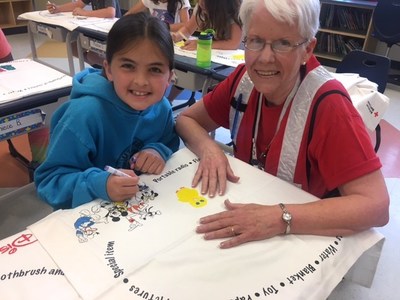 General Charles G. Harker third grade students draw on their pillowcases during an American Red Cross Pillowcase Project presentation. Kristee Lauro/American Red Cross