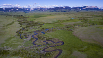 Confluence of Ford and Smith Creeks with backdrop of the Rocky Mountain Front