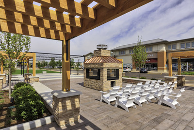 Features of the newly renovated gathering area include comfortable seating, pergola, fireplace, life-size chessboard, grassy expanses and more.