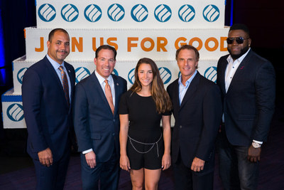 Pictured in front of a 20-foot cake by Montilio's at Eastern Bank's 200th anniversary celebration are left to right: Eastern Bank President Quincy Miller, Eastern Bank Chair and CEO Bob Rivers, Partners For Good Aly Raisman, Doug Flutie and David Ortiz.