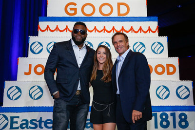 Pictured in front of a 20-foot cake by Montilio's at Eastern Bank's 200th anniversary celebration are left to right: Eastern Bank's Partners For Good David Ortiz, Aly Raisman and Doug Flutie.