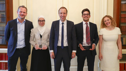 Matt Hancock, Secretary of State for Culture, Media and Sport, with CognitionX co-founders Tabitha Goldstaub and Charlie Muirhead, and CogX Award winners Noor Shaker and Dhruv Ghulati at Number 10 Downing Street (PRNewsfoto/CognitionX)