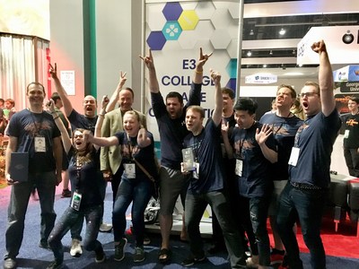 Mike Gallagher, CEO of ESA, celebrates with Brigham Young University video game team, winners of The E3 College Game Competition, for their game, Beat Boxers. Los Angeles, June 14, 2018.