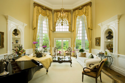 The centerpiece of the main estate is a two-story, grand salon, which is both elegant and comfortable. Soaring windows provide beautiful views of the estate grounds. More at VirginiaLuxuryAuction.com.