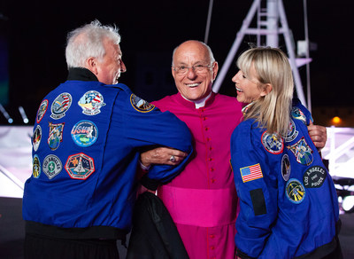 Monsignor Liberio Andreatta (center) helps Viking Chairman Torstein Hagen (left) and Senior Vice President Karine Hagen (right) show off custom NASA flight jackets given as a token of appreciation from Viking Orion's ceremonial godmother Dr. Anna Fisher, retired NASA astronaut. For more information, visit www.vikingcruises.com