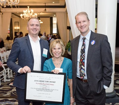 Aimco's Regional Property Manager Richard Derby and Senior Vice President Patti Shwayder are joined by Paul Steinke, Executive Director of the Preservation Alliance for Greater Philadelphia, as they accept a Grand Jury Award for the rehabilitation of The Sterling Apartment Homes.