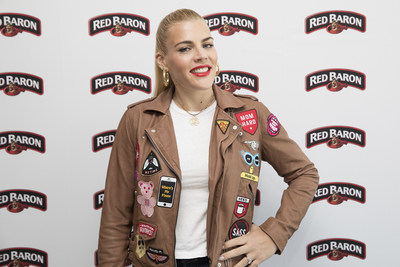 Busy Philipps speaks with media in New York to announce a new partnership with Red Baron pizza. Red Baron pizza, mom's ultimate #wingmama, is serving up free groceries and delivery to 5,000 parents across the country, starting June 19, 2018. (Amy Sussman/AP Images for Red Baron)
