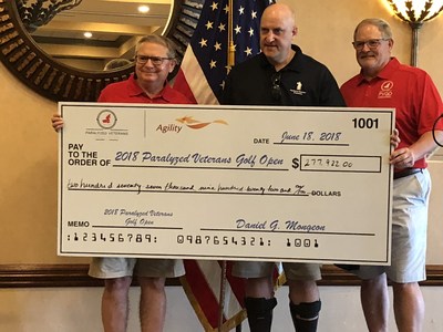Major General Daniel G. Mongeon (left), U.S. Army veteran and President & CEO, Agility Defense & Government Services and Rich Brooks (on far right), Retired U.S. Army Colonel, Chairman, Paralyzed Veterans Golf Open and President, Agility Defense & Government Services, LLC present Paralyzed Veterans of America National President David Zurfluh, an Air Force veteran with check at 2018 Paralyzed Veterans Golf Open