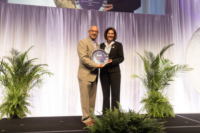 Lou Holland Jr presents Sen. Catherine Cortez Masto (D-Nev.) with the Alzheimer's Impact Movement Humanitarian Award. Photo Credit: Alzheimer's Association