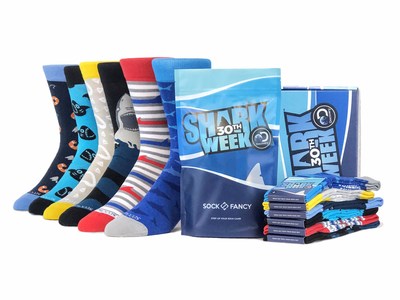 The official Sock Fancy x Discovery Shark Week collection featuring six shark inspired designs, each showcasing iconic summer themes .